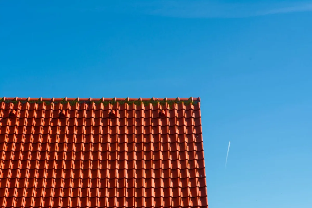 Tile roof gable in full sun, the kind of exposure that sets roof life in Yonkers, NY